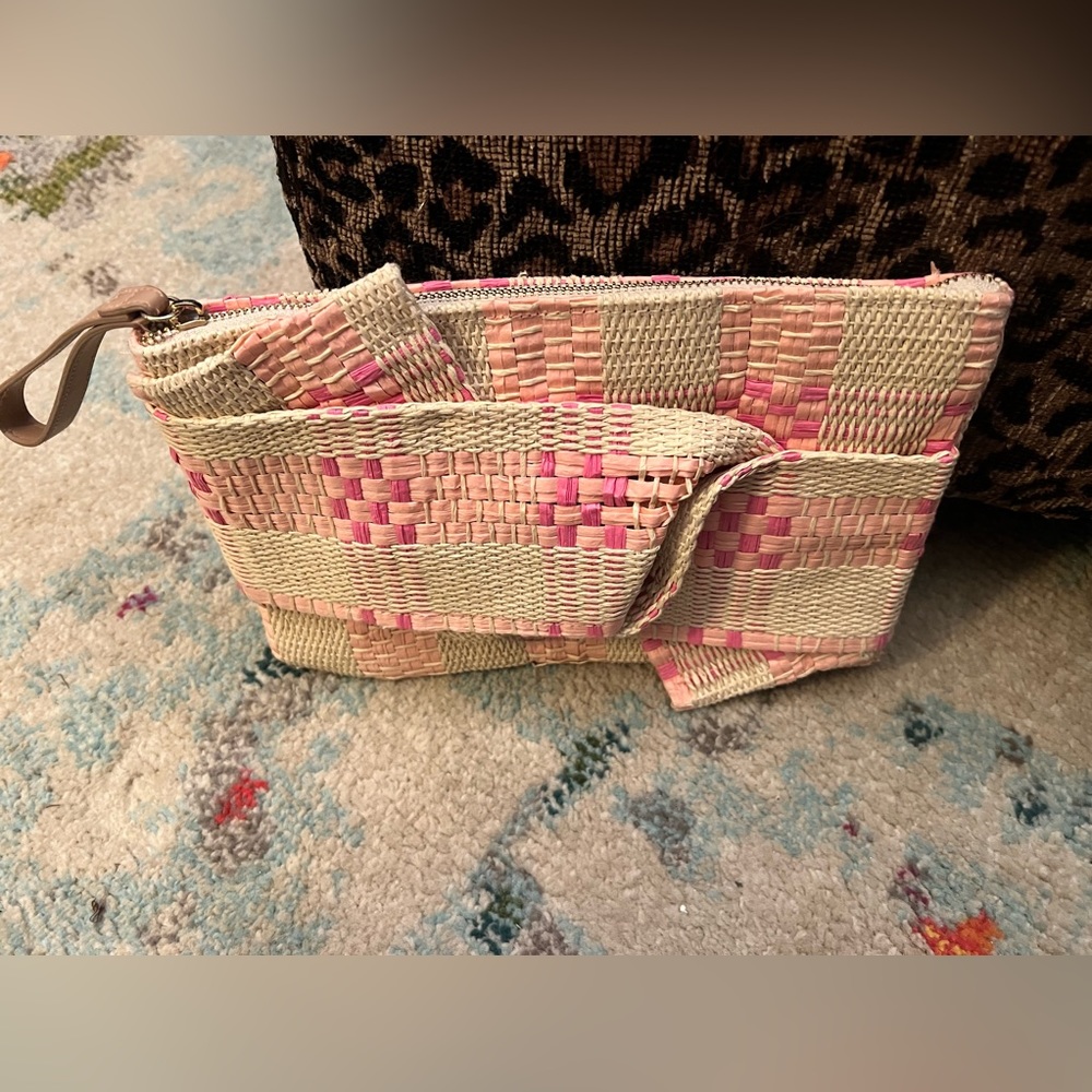 New day clutch straw purse. Pink and white with handle.